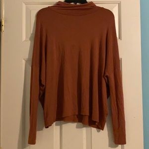 Flowy maroon turtleneck shirt
